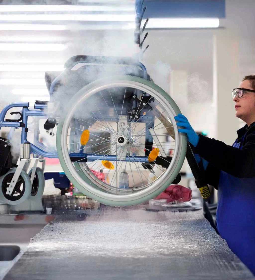 Wheelchair being cleaned with steam